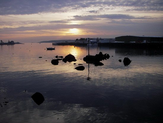 image of a sunset over the water